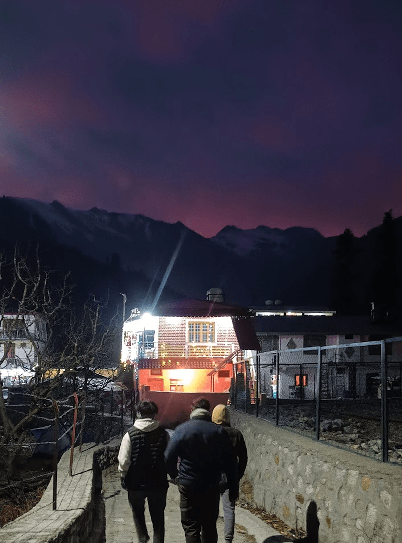 Snow-capped mountain at sunset